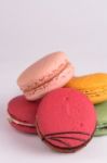 Colorful Macaroons On White Background. Macaron Or Macaroon Is S Stock Photo