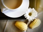 French Madeleines With Coffee And White Daisy Stock Photo
