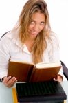 Top View Of Smiling Student Reading Book Stock Photo