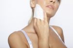 Young Woman Clean Face With Wet Wipes Stock Photo