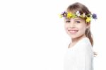 Young Smiling Girl Wearing Flower Wreath Stock Photo