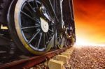 Iron Wheels Of Stream Engine Locomotive Train On Railways Track Stock Photo