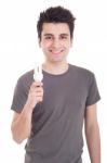 Man Holding Lightbulb Stock Photo