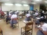 Blur Background University Students Writing Answer Doing Exam In Stock Photo