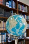 Globe Ball In Library Stock Photo