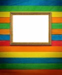 Gold Picture Frame On Colorful Wood Stock Photo