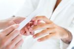 Man Doing Manicure In Salon. Beauty Concept Stock Photo