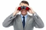 Young Officer Looking Through Binoculars Stock Photo