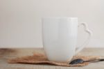 Cups On Wooden Floor Stock Photo