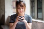 Portrait Of Thai Adult Beautiful Girl Drinking Coffee Stock Photo