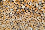 Stack Of Firewood As Tree Trunks Stock Photo