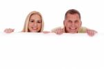 Couple Holding Empty White Board Stock Photo