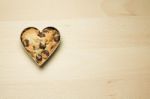 Cookie In Heart Shape On Wooden Table Stock Photo