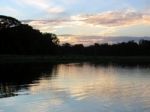 Sunset In The Amazon Stock Photo