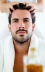 Masseur Doing Massage On Man Body In The Spa Salon Stock Photo