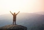 Young Man  Asia Tourist  At Mountain Is Watching Over The Misty Stock Photo