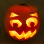 Carved Lit Halloween Pumpkin Stock Photo