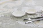 Empty White Plate And Small Chalice On Table Stock Photo