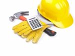 Hat Hammer Calculator and Gloves Stock Photo