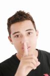 Young Man With Shh Sign Stock Photo