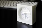 White Clock, Keyboard, Business Table In The Office Stock Photo