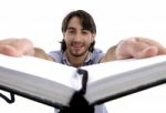 Smart Guy Holding His Opened Diary Stock Photo