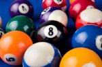 Billiard Balls In A Blue Pool Table Stock Photo