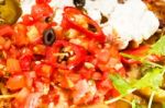 Fresh Nachos And Vegetable Salad With Meat Stock Photo