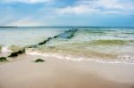 Beach With Breakwater Stock Photo