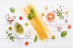 Ingredients For Homemade Pasta On Wooden Background Stock Photo