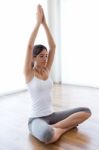 Beautiful Young Woman Doing Yoga Exercises At Home Stock Photo