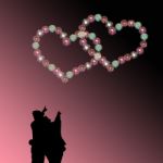 Couple Watching Heart Firework Stock Photo