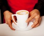 Hands Of Waiter Serving A Cup Of Cappucino Stock Photo