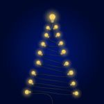 Colorful Light Bulbs And Christmas Tree Symbol .merry Christmas Stock Photo