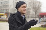 Man With Mobile Phone Traveling Stock Photo