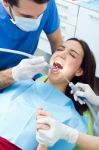 Cute Young Woman At The Dentist. Mouth Checkup Stock Photo