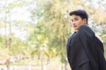 Business Man Standing On The Balcony Stock Photo