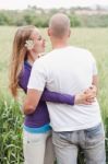 Young Romantic Couple Standing Together Stock Photo