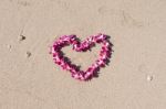 Heart Orchid Flower Garland White Sand Beach Stock Photo