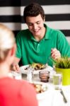 Handsome Young Guy Enjoying His Meal Stock Photo