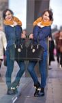 Pretty Young Girl Standing At Shopfront Stock Photo