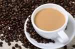 Cup Of Hot Coffee And Beans Stock Photo