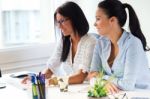 Two Business Woman Working In Office With Computer Stock Photo