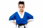 Little Girl In A Kimono With A Black Sash Stock Photo