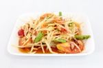 Thai Food Papaya Salad On White Dish Stock Photo