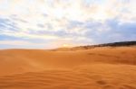 Red Sand Dune And Sunset Stock Photo