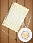 Blank Notebook With Coffee Cup On Table Stock Photo