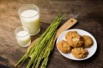 Almond Cookies With Rice Milk And Ear Of Rice  On Old Wooden Tab Stock Photo