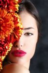 Woman And Flowers Stock Photo