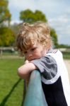 Young Boy Contemplating Stock Photo